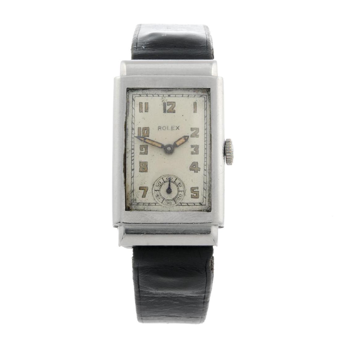 ROLEX - a gentleman's wrist watch. Stainless steel: ROLEX - a gentleman's wrist watch. Stainless steel case. Numbered 2415 571122. Unsigned manual wind movement. Silvered dial with Arabic numeral hour markers, subsidiary seconds dial to six. Fitted to 