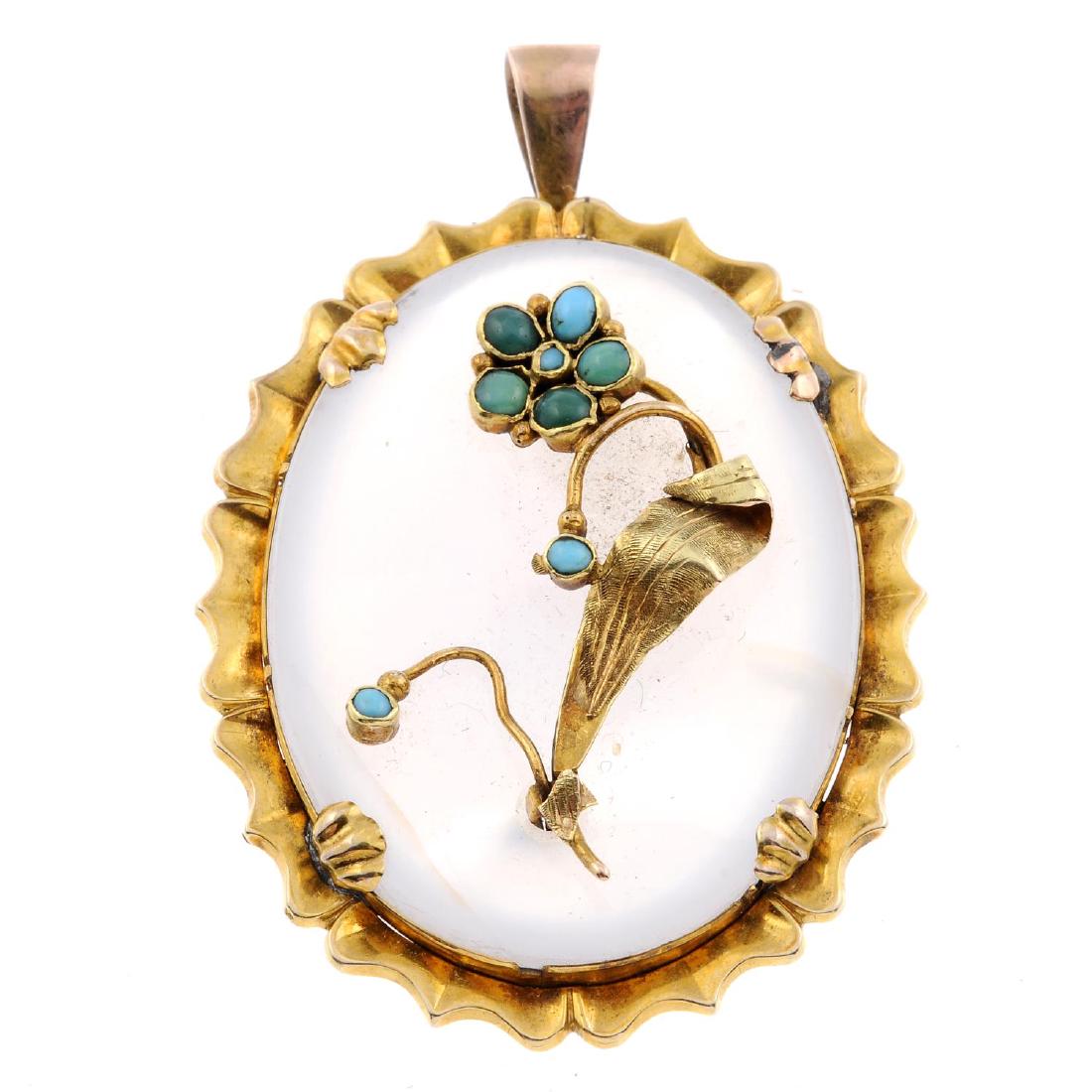 A late Victorian gold chalcedony pendant.  Of oval (1 of 2)