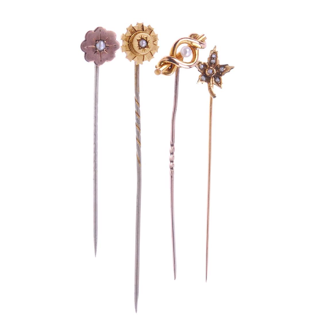 Four split pearl stickpins. One in the shape of a leaf, (1 of 2)