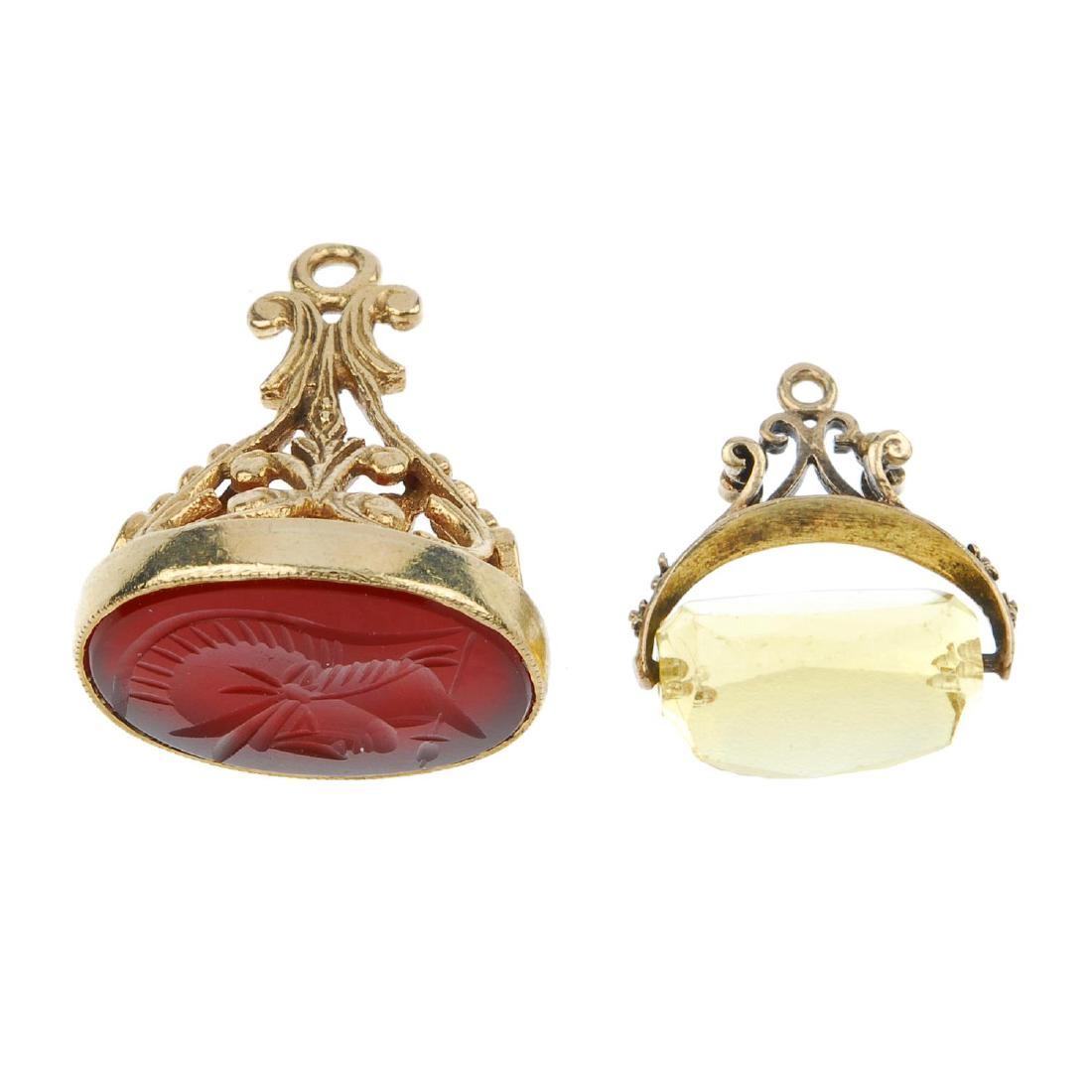 Two 9ct gold gem-set fobs. One an oval-shape carnelian (1 of 2)