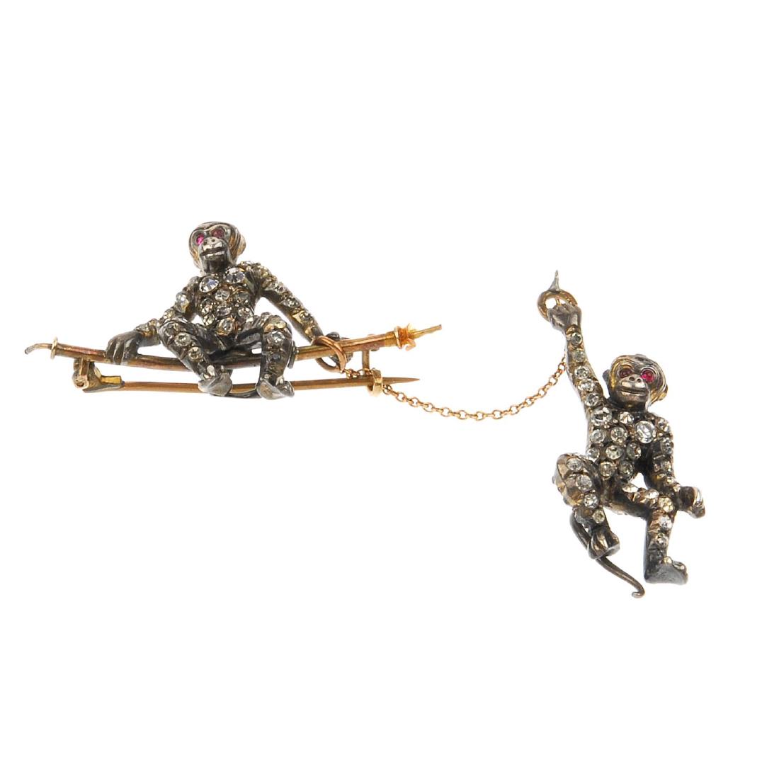 An early 20th century silver paste monkey brooch. The (1 of 2)