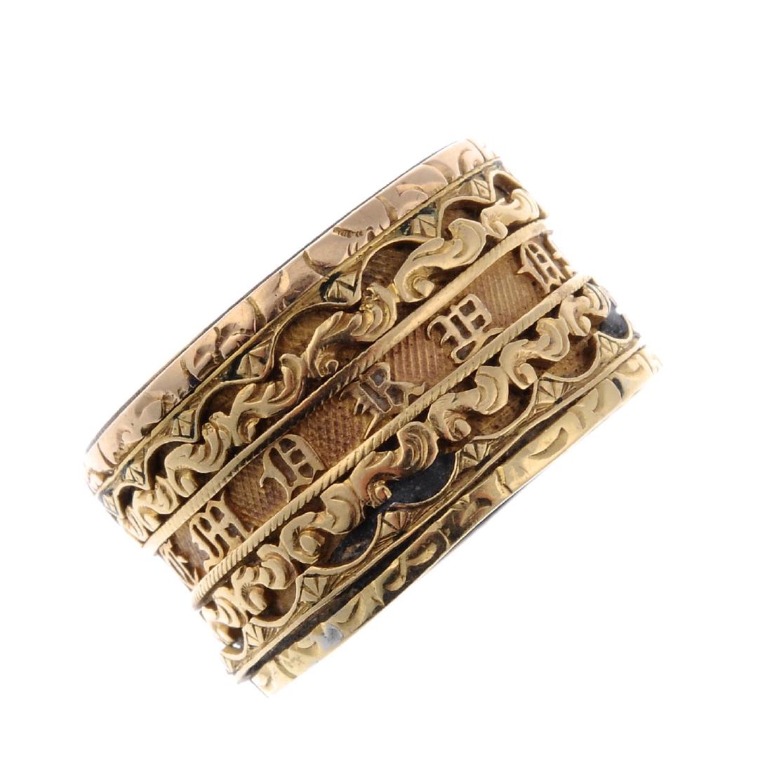 A mid Victorian 18ct gold memorial ring. A broad ring (1 of 3)