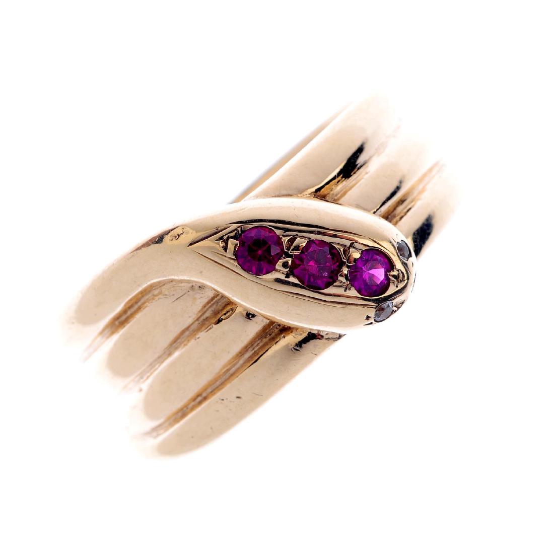 A 9ct gold synthetic ruby snake ring. Designed as a (1 of 3)