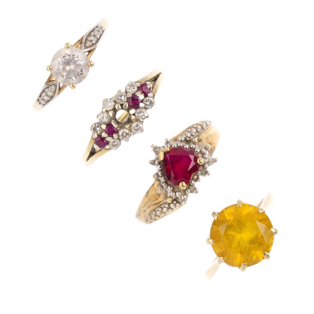 Four 9ct gold gem-set rings. To include a citrine (1 of 2)