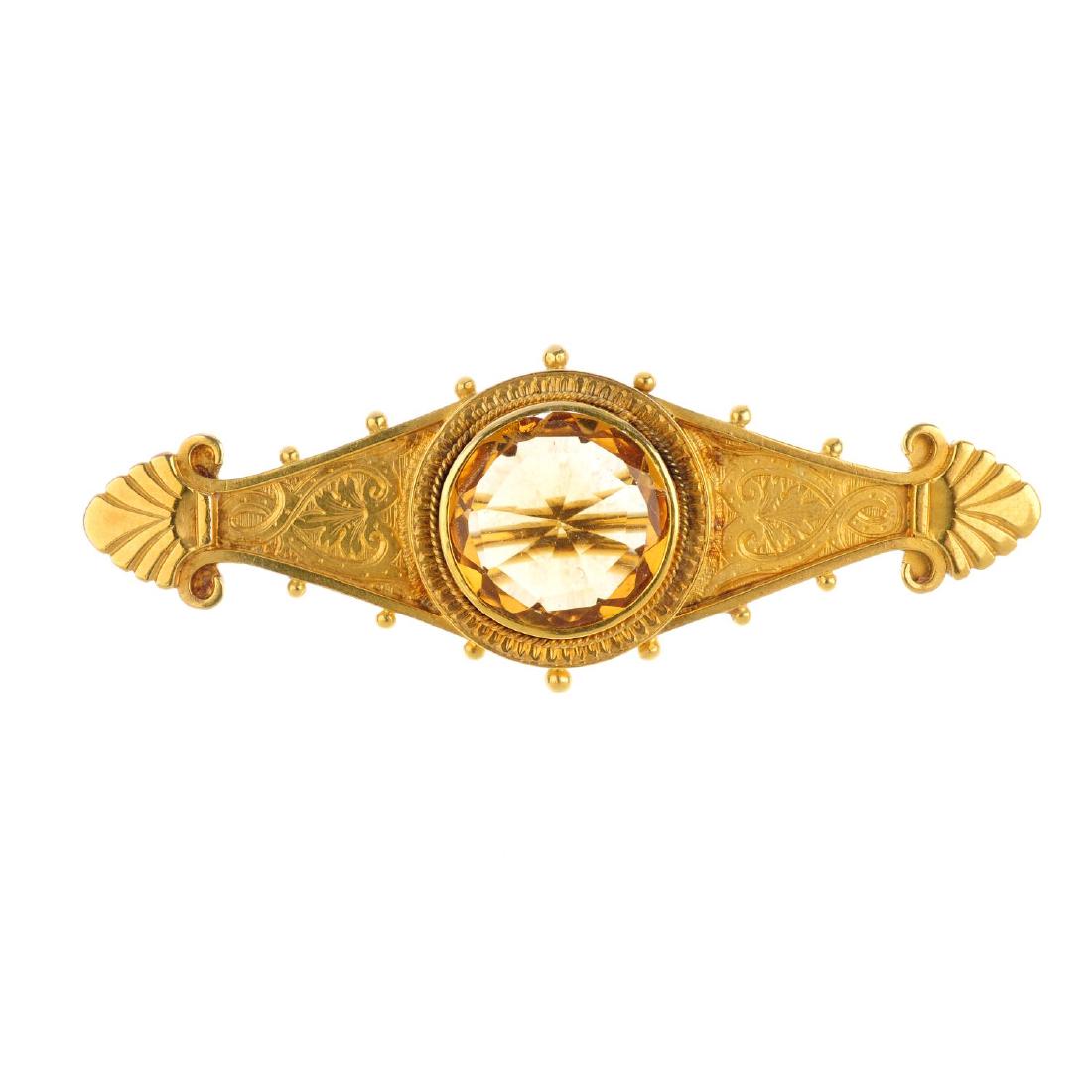 An early 20th century gold citrine brooch. The (1 of 2)
