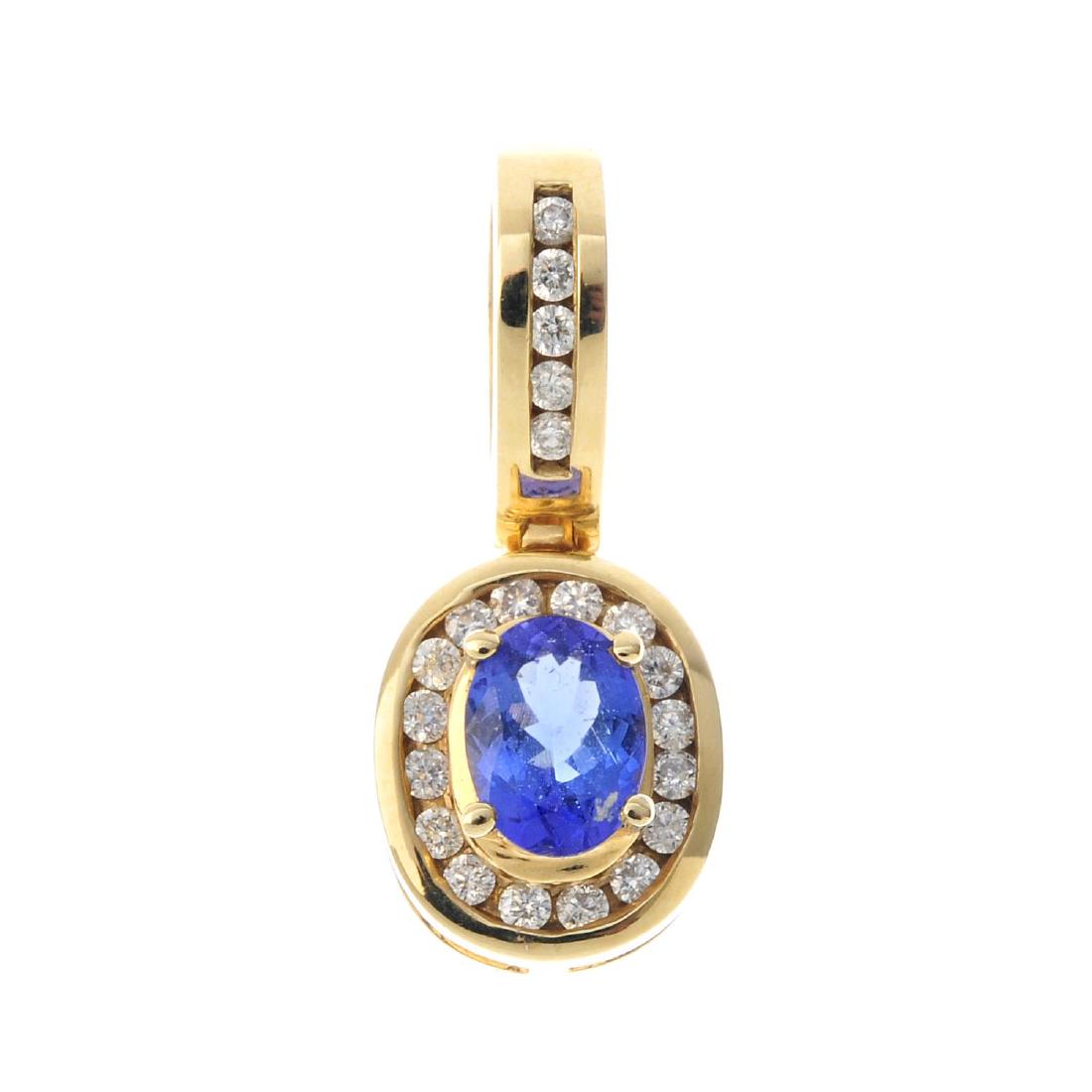 A tanzanite and diamond pendant. The oval-shape (1 of 2)