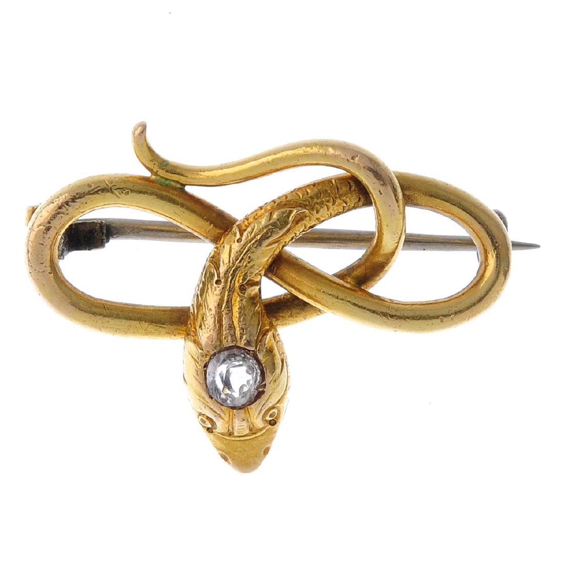 An early 20th century gold paste brooch. Designed as a (1 of 2)