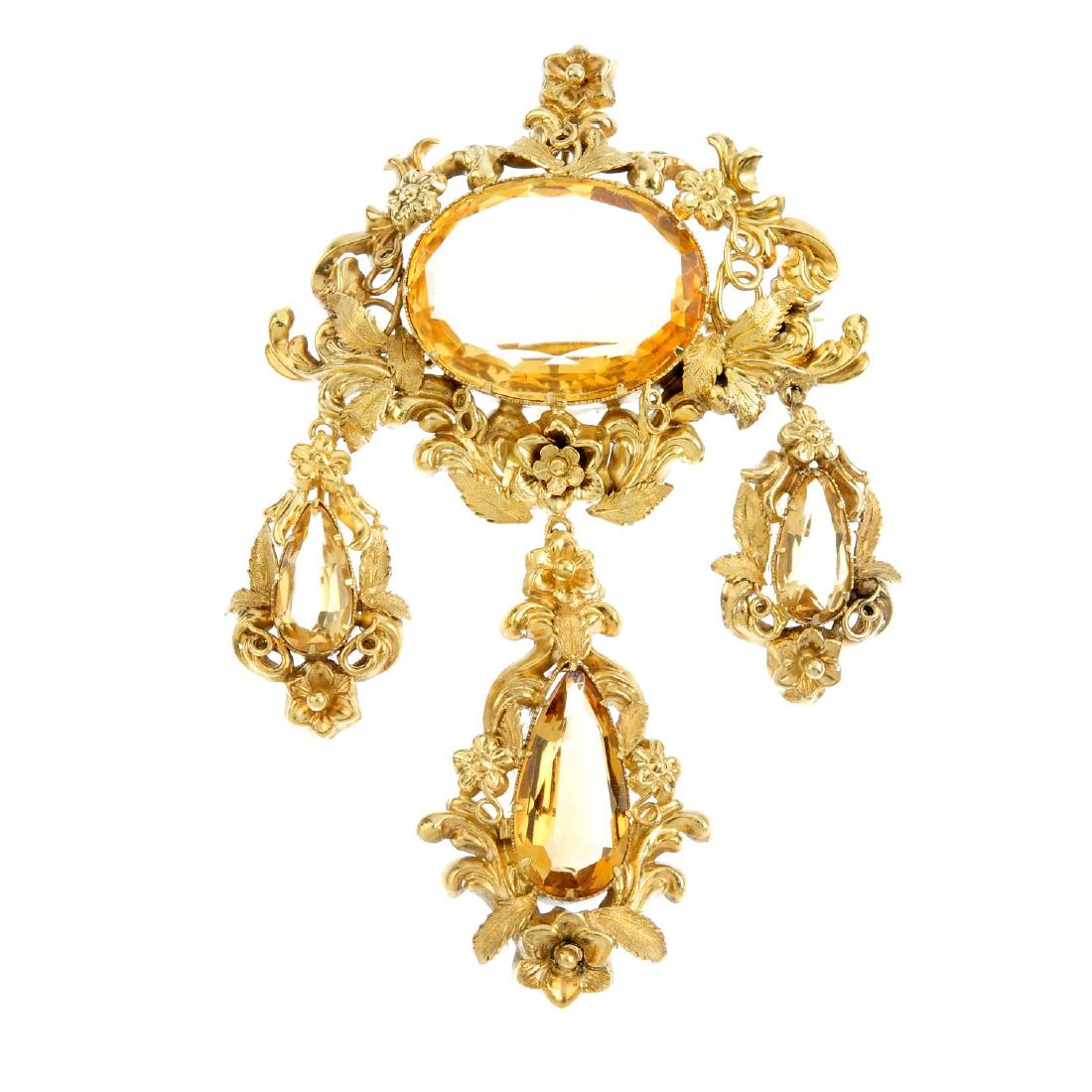 An early Victorian gold and citrine pendant. Designed (1 of 2)