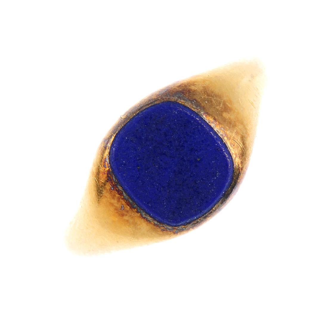 An 18ct gold lapis lazuli signet ring. The (1 of 3)