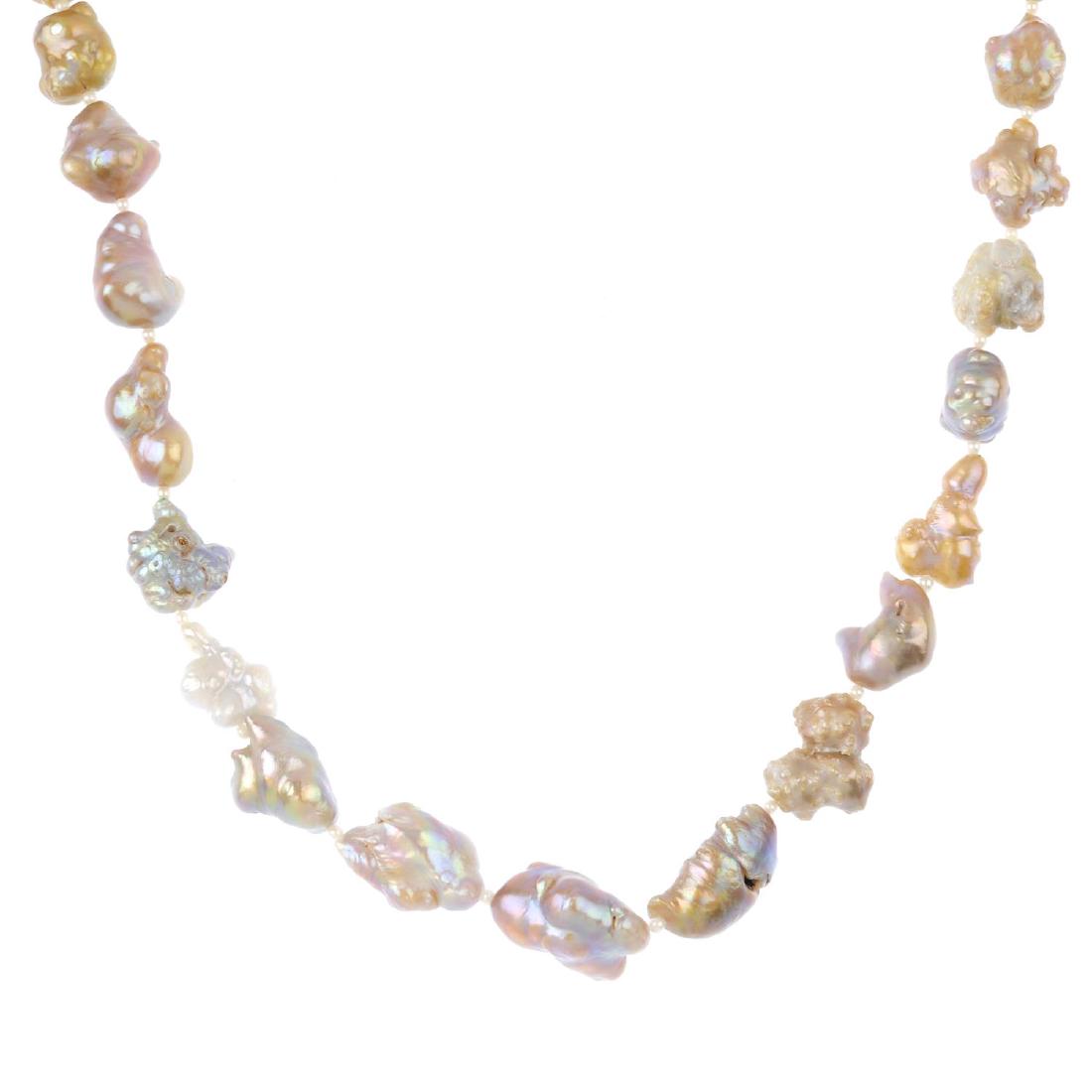 A natural pearl single-strand necklace. Comprising a (1 of 3)