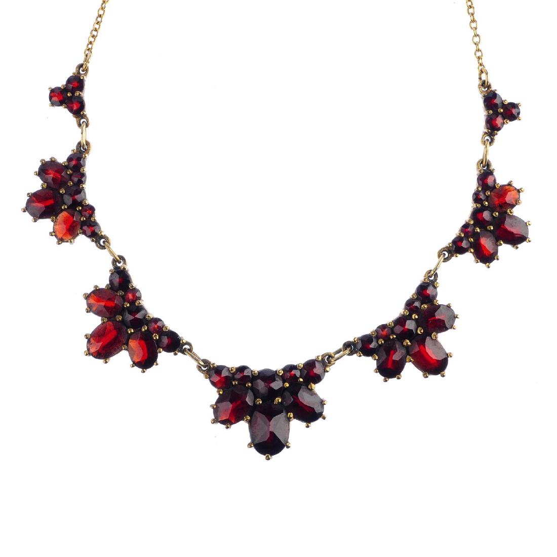 A garnet necklace. Designed as a series of graduated (1 of 4)