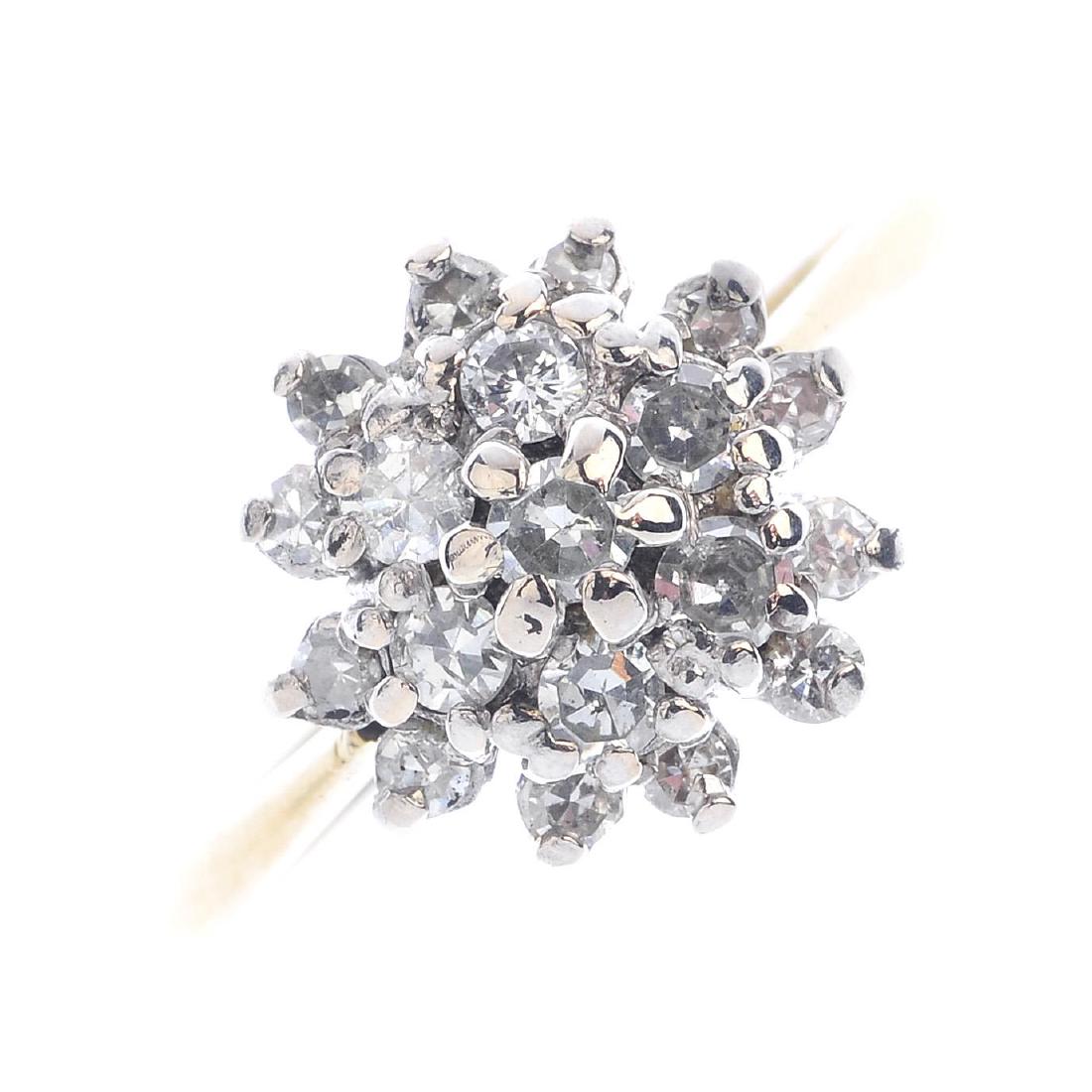 A diamond cluster ring. The single-cut diamond cluster, (1 of 2)
