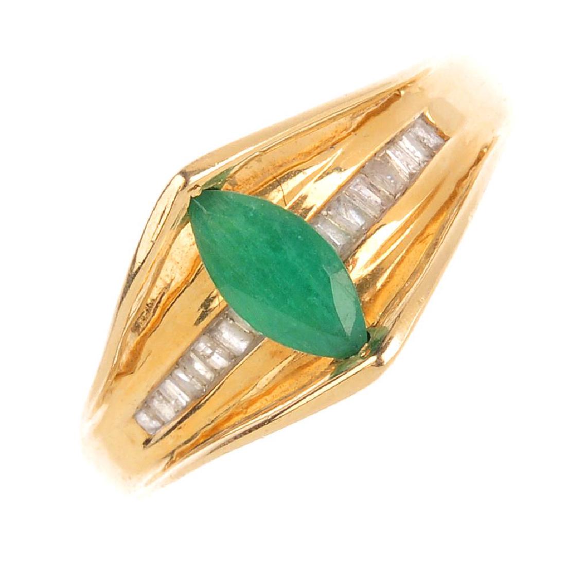 An emerald and diamond dress ring. The marquise-shape (1 of 3)