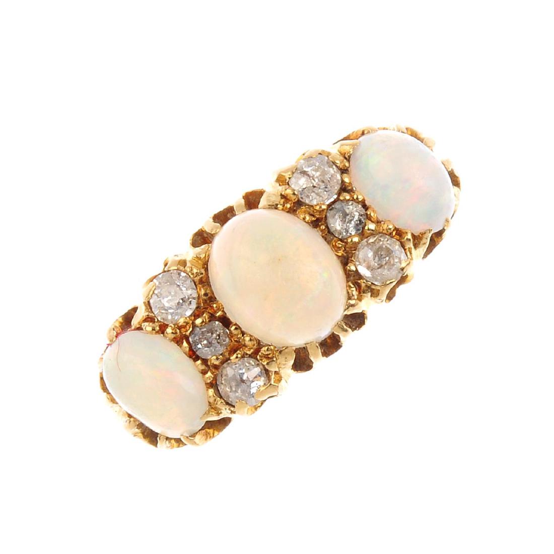 An Edwardian 18ct gold opal and diamond seven-stone (1 of 3)