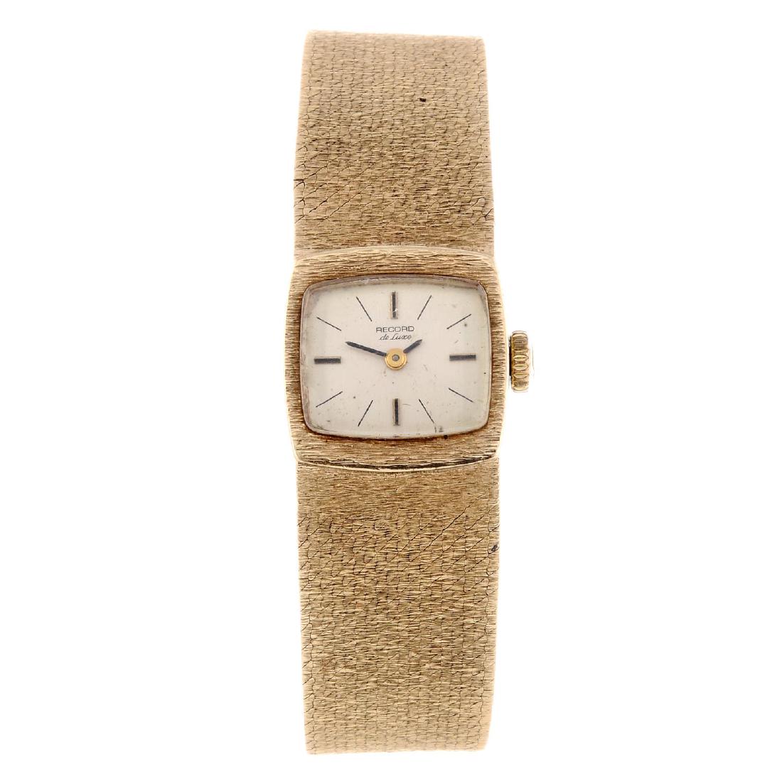 RECORD - a lady's 9ct gold bracelet watch. Case (1 of 4)
