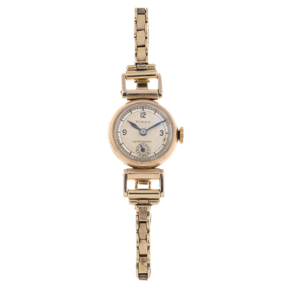 ROLEX - a lady's bracelet watch. 9ct yellow gold case, (1 of 4)