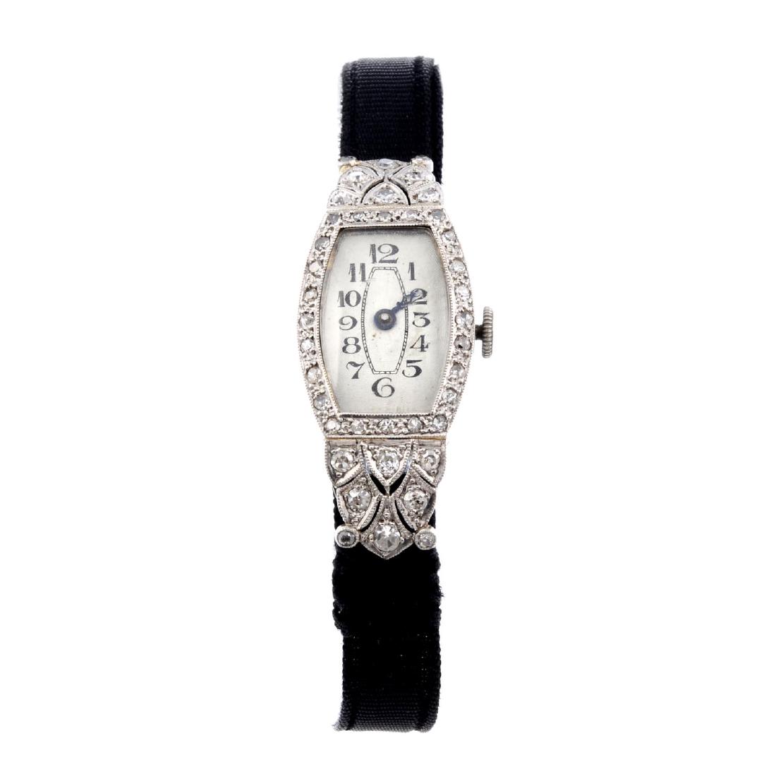 A lady's cocktail watch. Factory diamond set 18ct white (1 of 3)