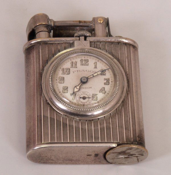 A silver rectangular shaped petrol lighter with r (1 of 1)