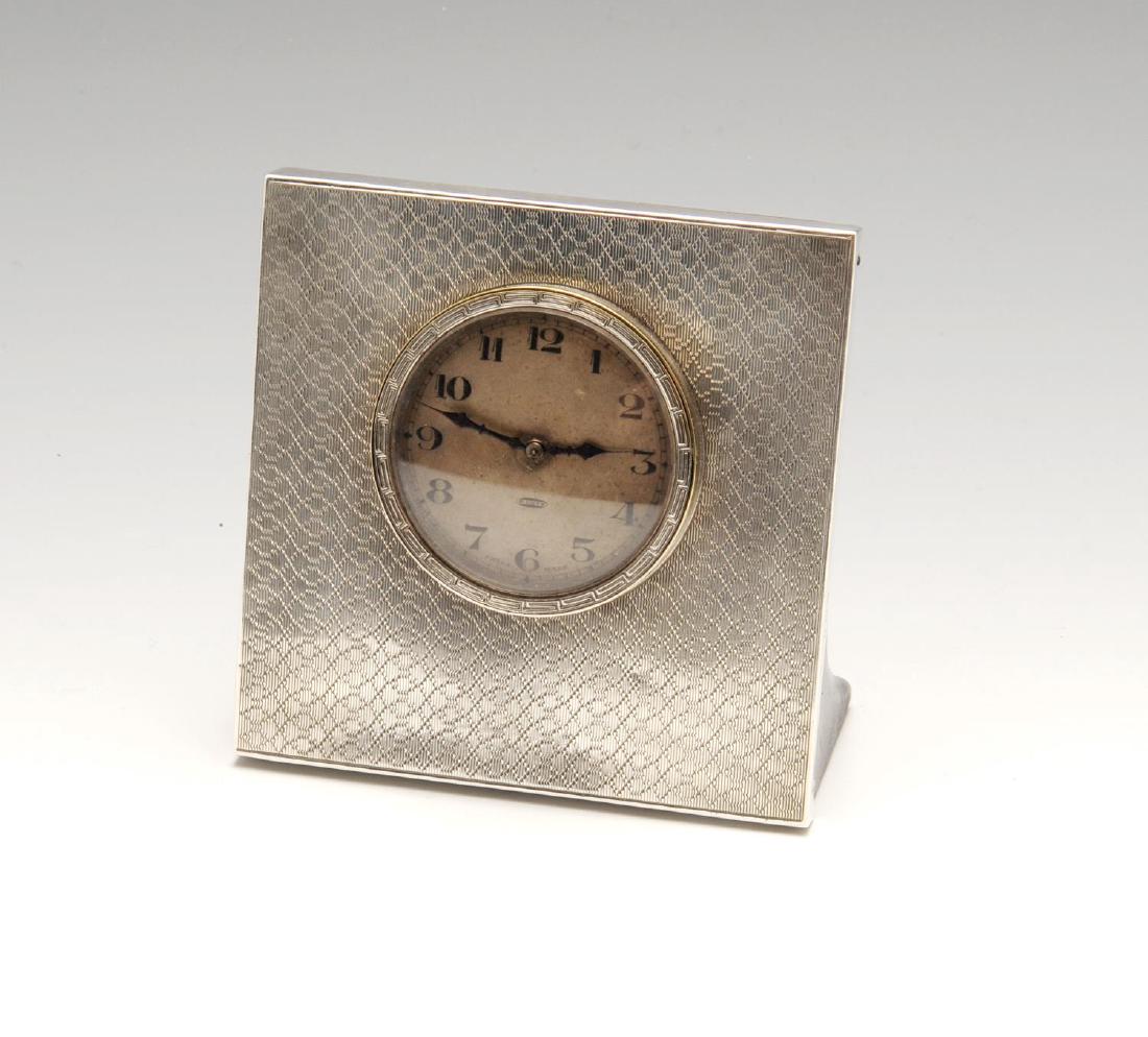 A 1920's silver mounted desk clock, of square shaped (1 of 4)