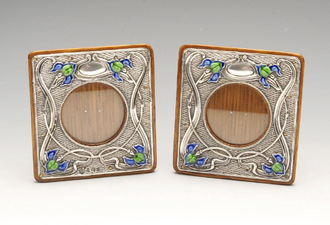 A matched pair of Art Nouveau silver mounted photograph (1 of 4)
