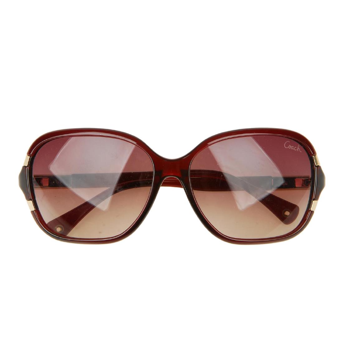 COACH - a pair of sunglasses. Featuring oversized brown (1 of 4)