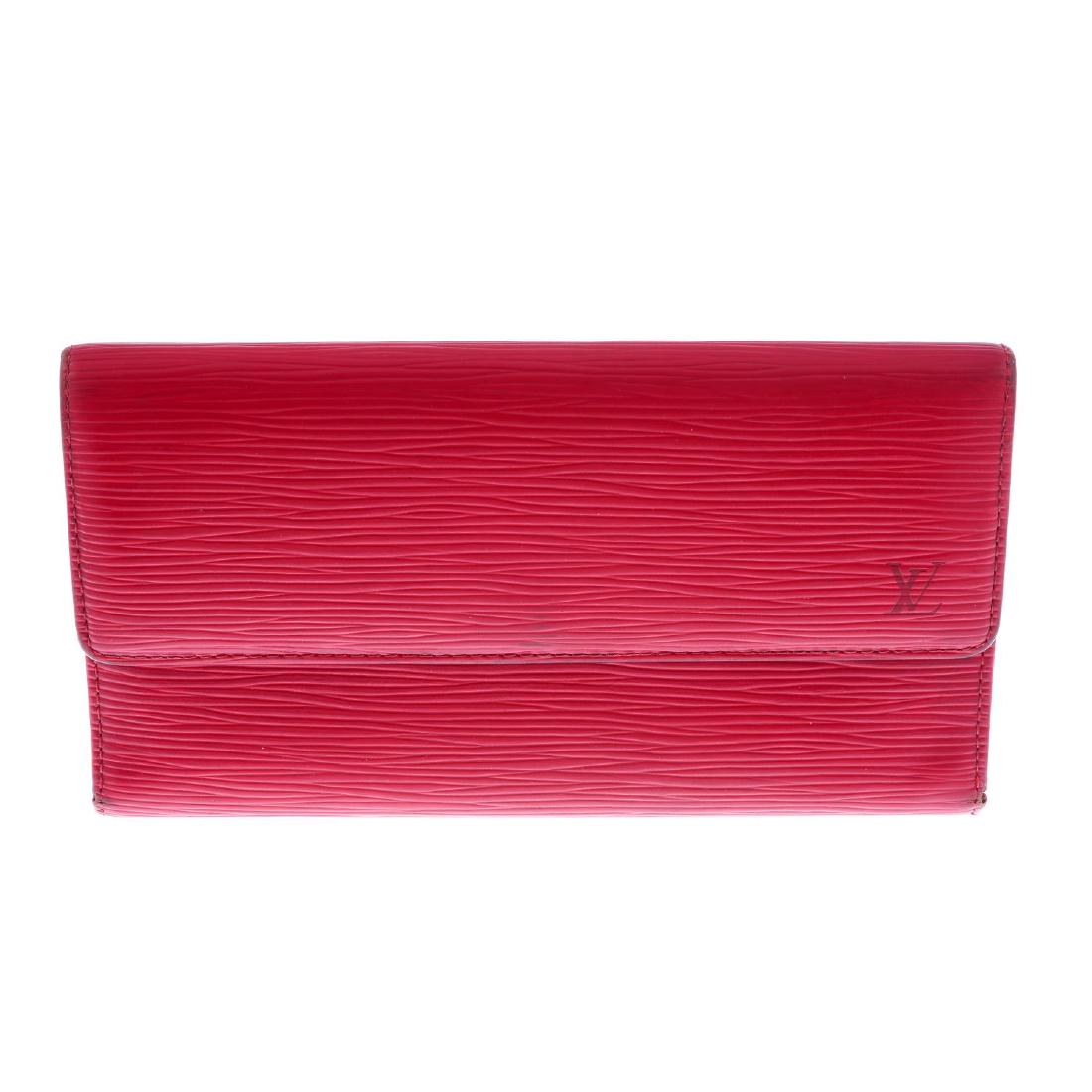 LOUIS VUITTON - a red Epi Porte Tresor International (1 of 2)