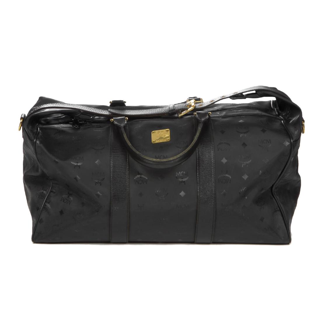 MCM - a black nylon Dieter Monogram holdall. Designed (1 of 5)