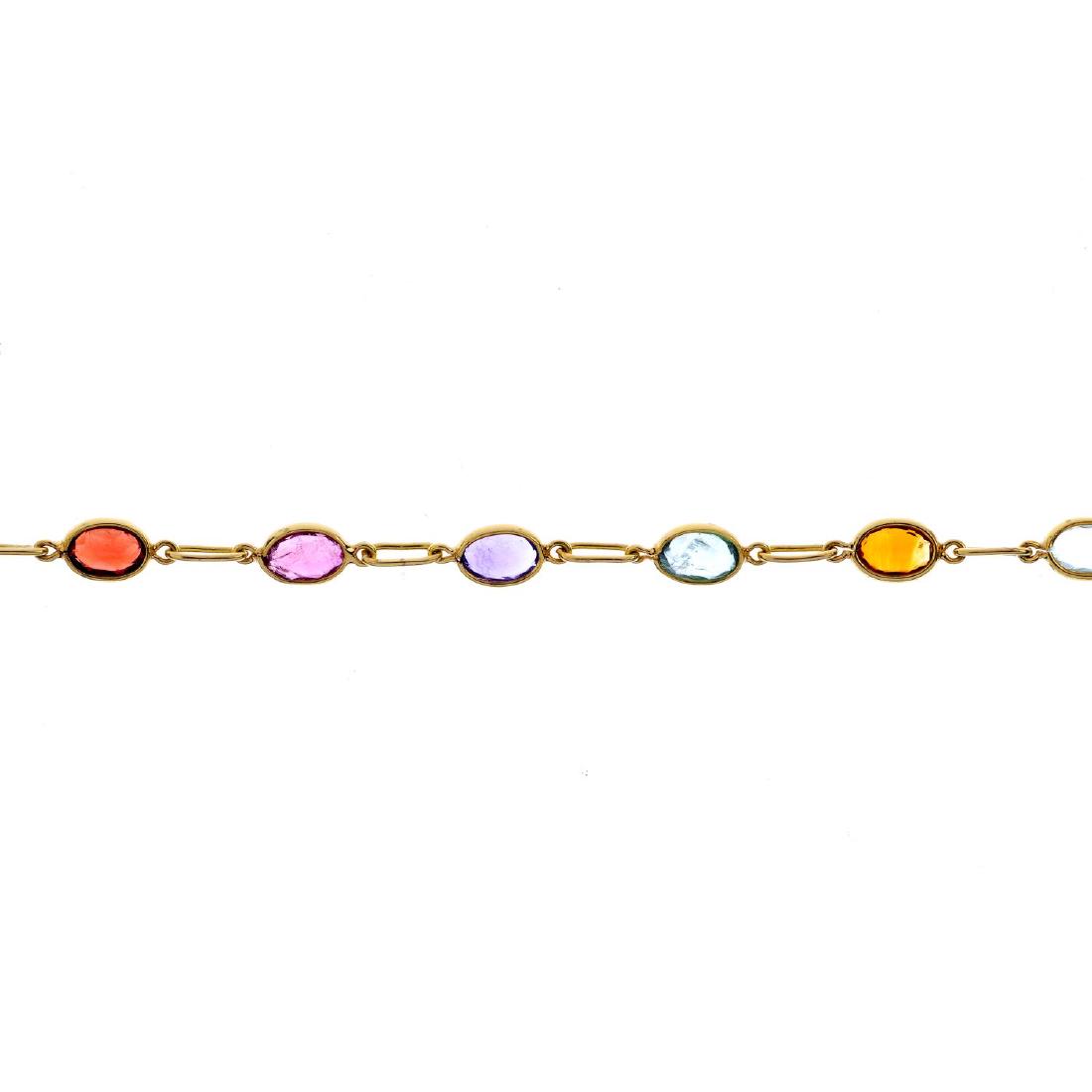 A gem-set bracelet. Designed as a series of oval-shape (1 of 3)