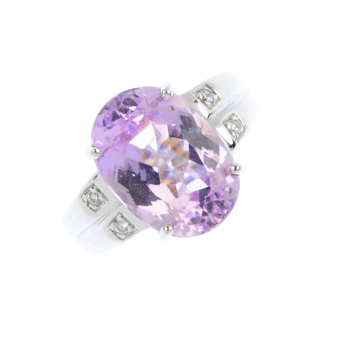An 18ct gold kunzite and diamond ring. The oval-shape (1 of 4)