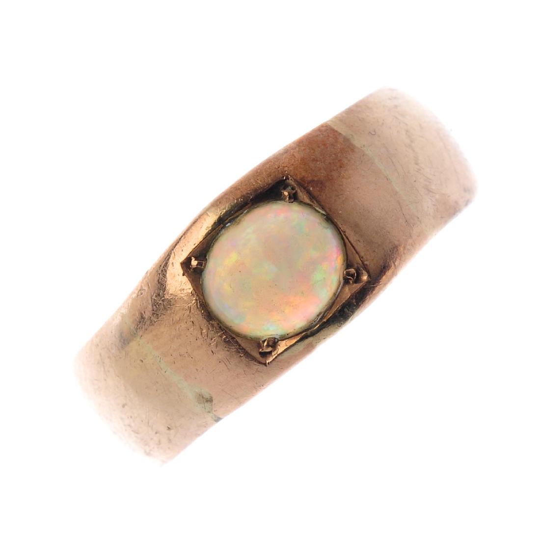 Two rings. To include a 9ct gold buckle ring, together (1 of 3)