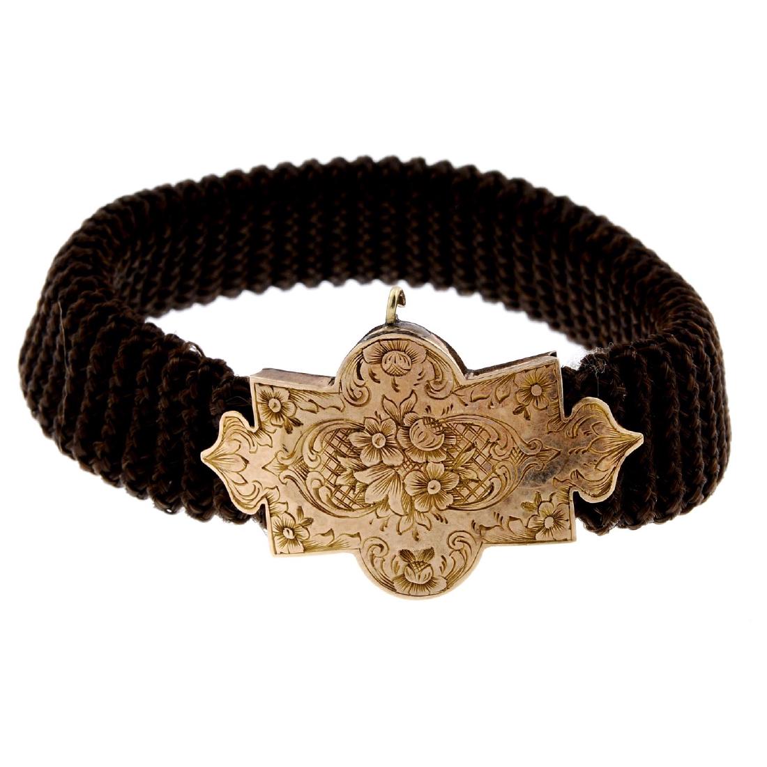 A mid Victorian memorial hair bracelet with 15ct gold (1 of 4)