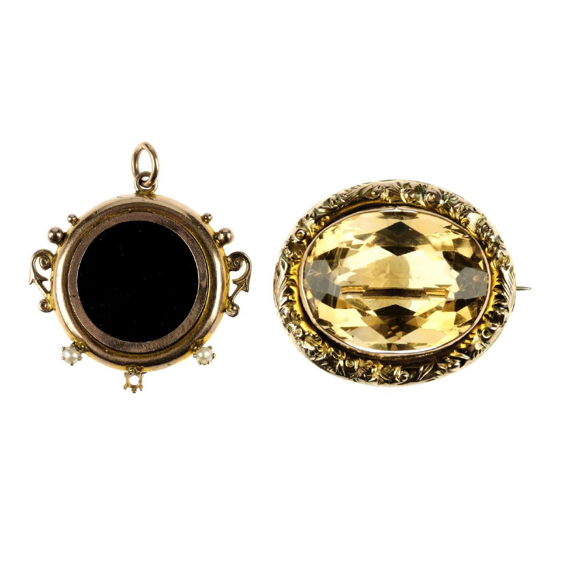 An early 20th century 9ct gold citrine brooch and (1 of 2)