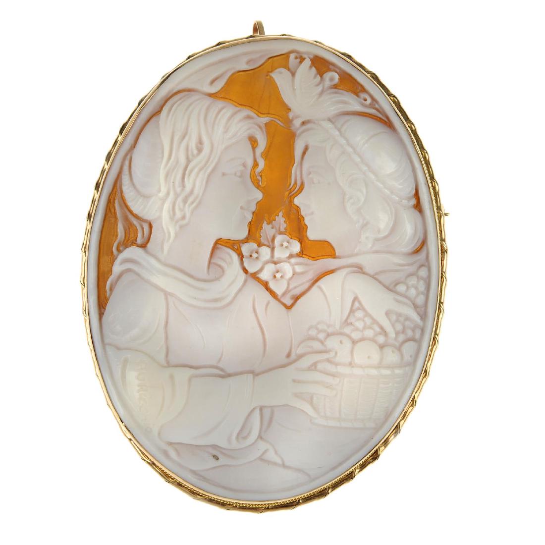 A cameo brooch. Of oval outline, depicting two young (1 of 2)