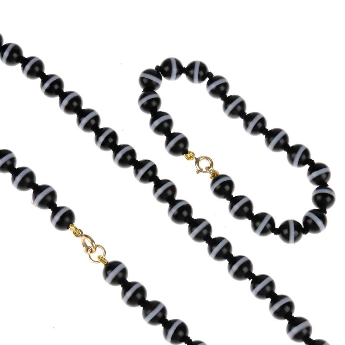 A banded agate necklace, bracelet and ear studs. Each (1 of 2)