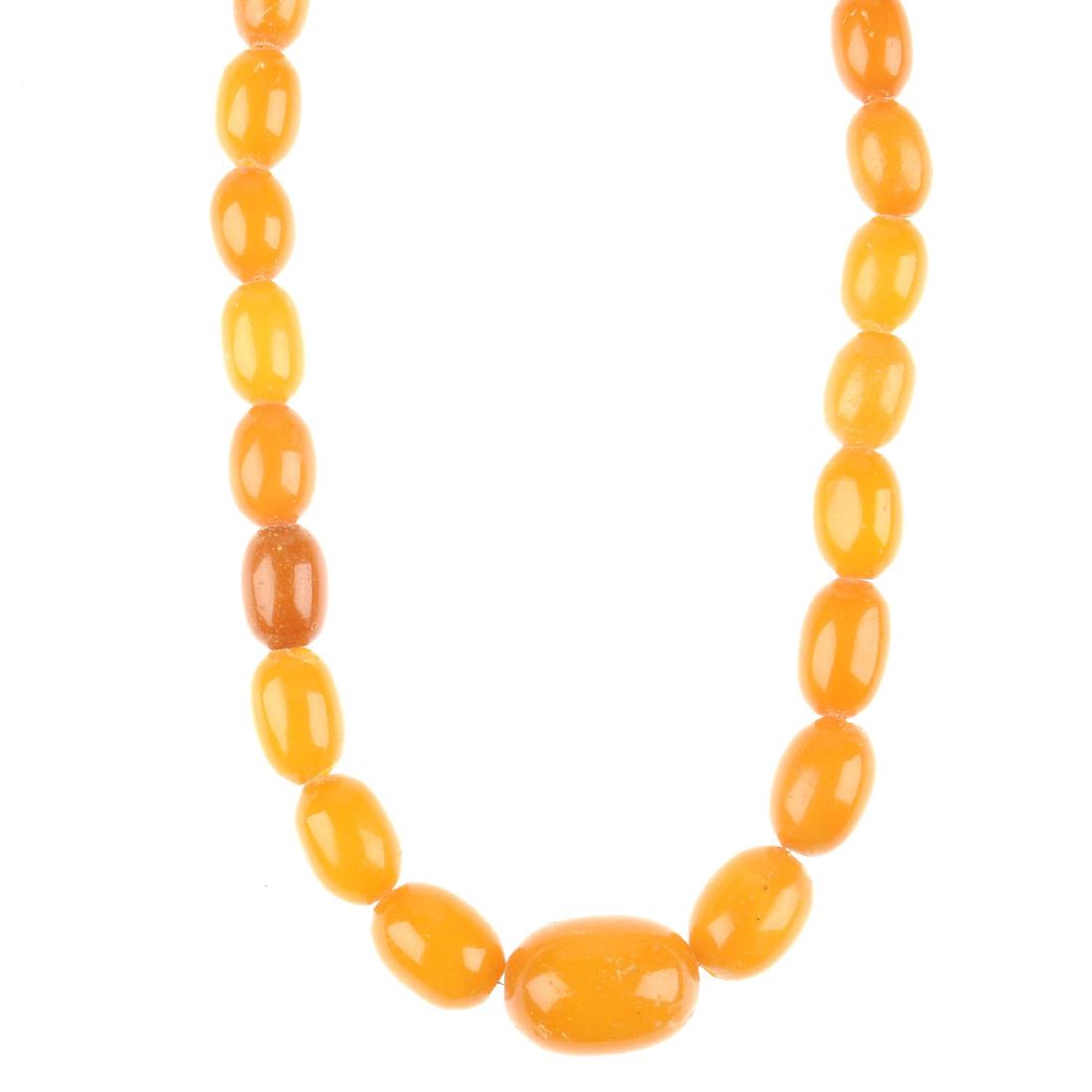 A natural amber bead necklace. Designed as graduated (1 of 4)