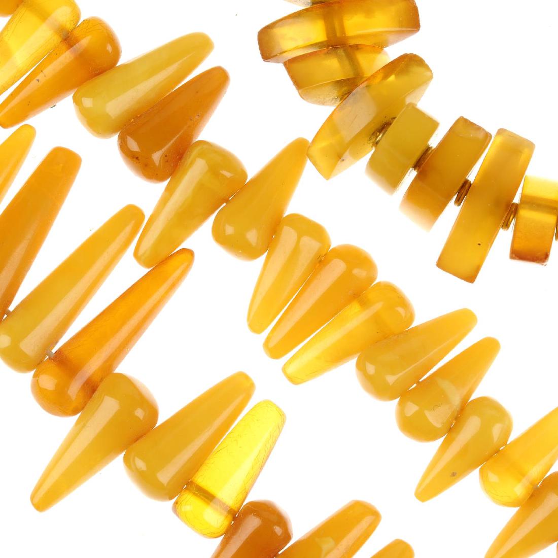 A selection of amber necklaces and a bracelet and two (1 of 2)