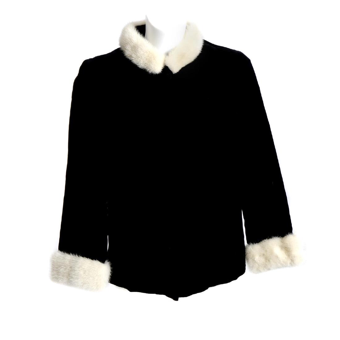 A velvet and mink jacket, a marmot stole and a coney: A velvet and mink jacket, a marmot stole and a coney fur stole. To include a black velvet jacket with pearl mink fur mandarin collar and fur cuffs, covered button fastening and two outer pockets, toge