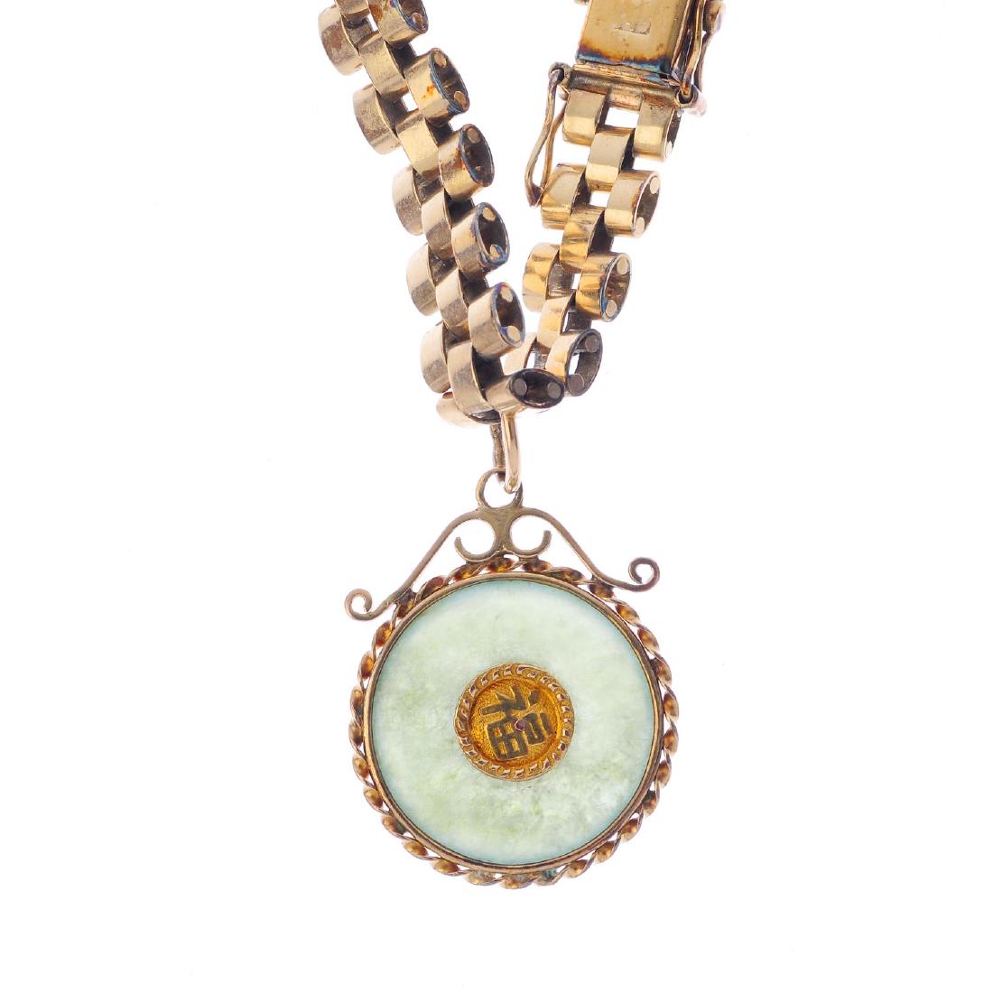 A jade bi charm bracelet. Designed as a jadeite bi, (1 of 3)