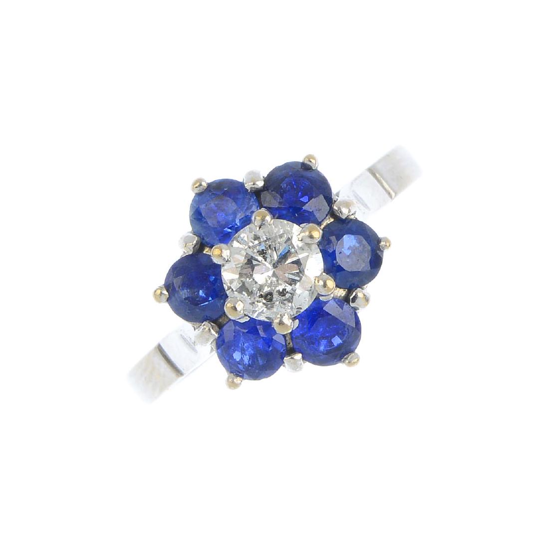 A sapphire and diamond cluster ring. The brilliant-cut (1 of 4)
