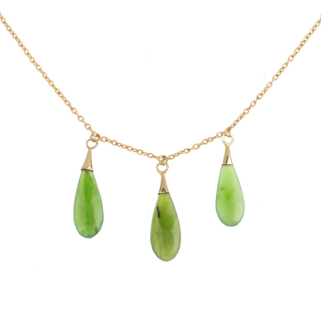 A jade necklace. Designed as three pear-shape nephrite (1 of 3)