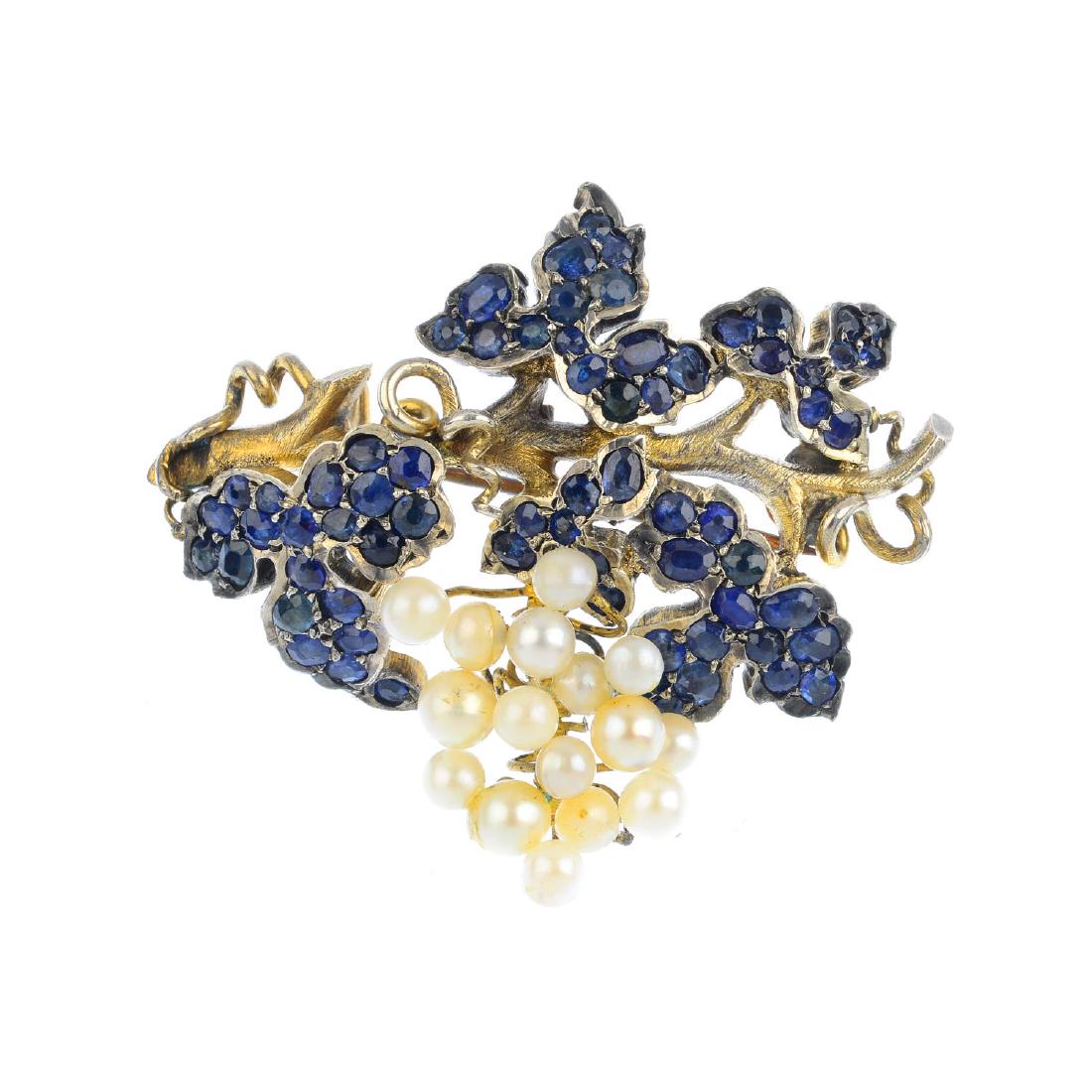 A sapphire and seed pearl brooch. Designed as a bunch (1 of 2)