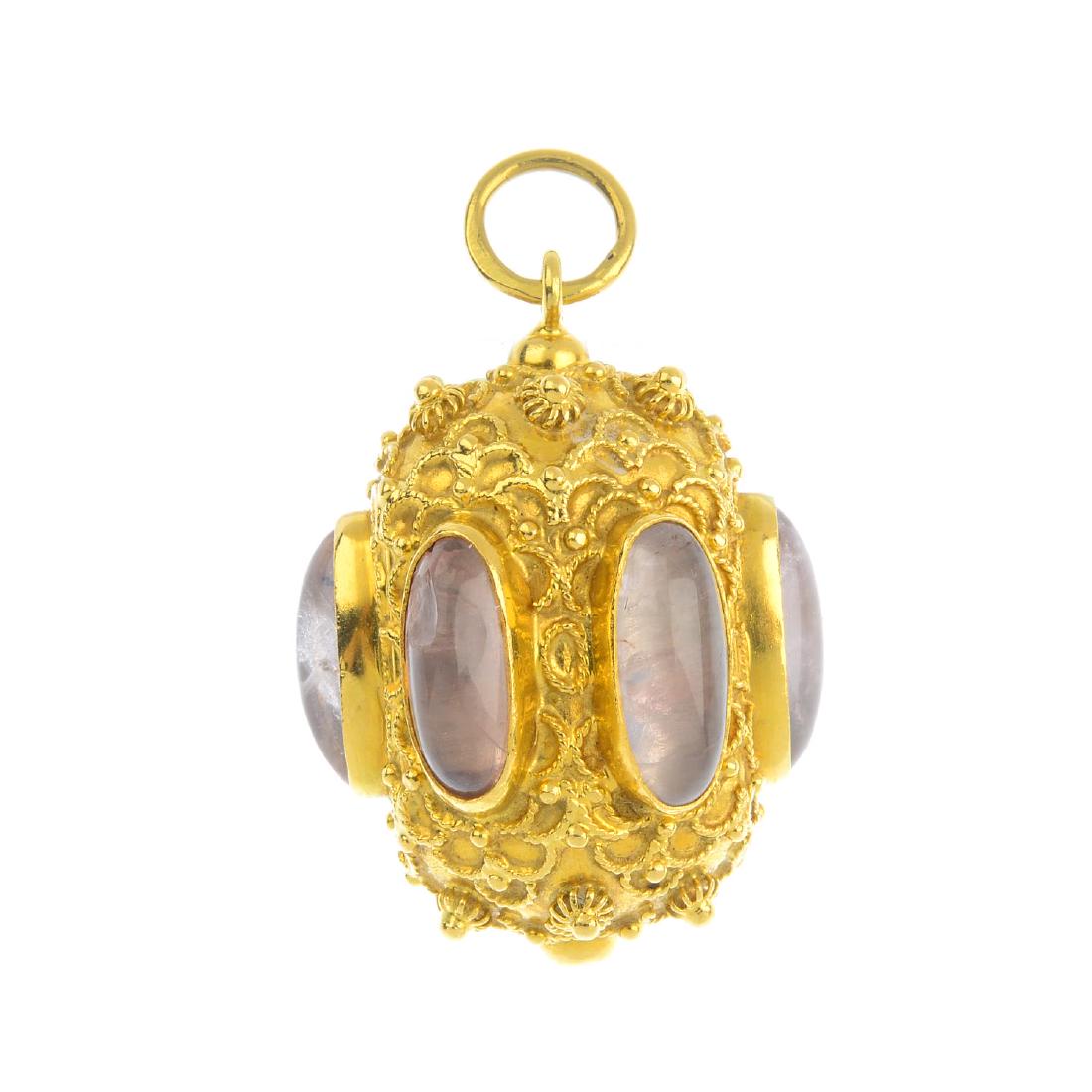 A rose quartz pendant. Designed as a series of oval (1 of 2)