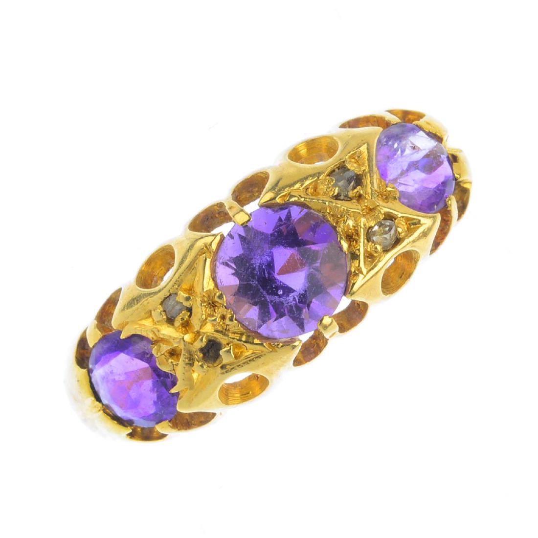 An early 20th century 18ct gold amethyst three-stone (1 of 3)