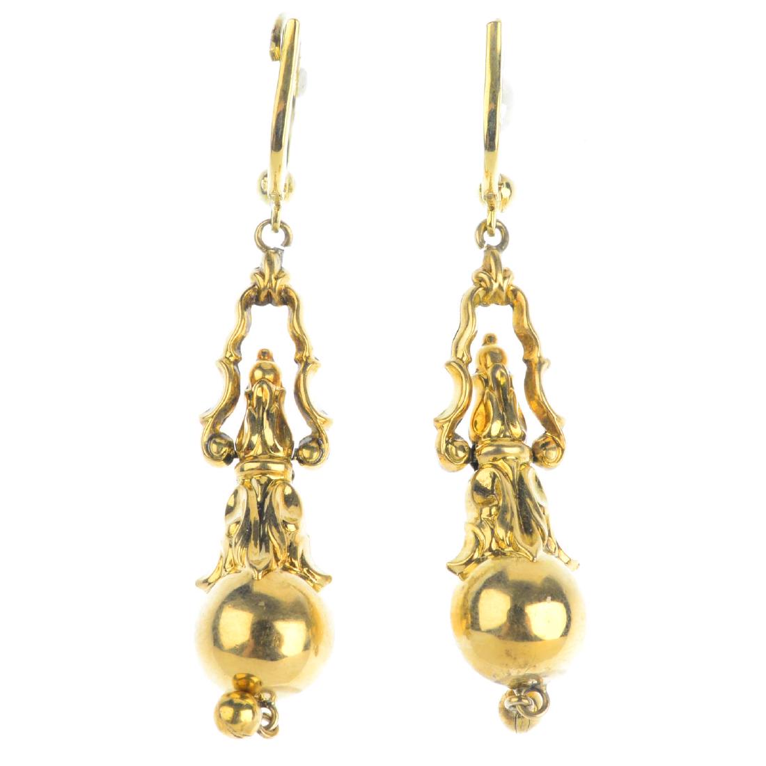 A pair of late Victorian gold earrings. Each designed (1 of 2)