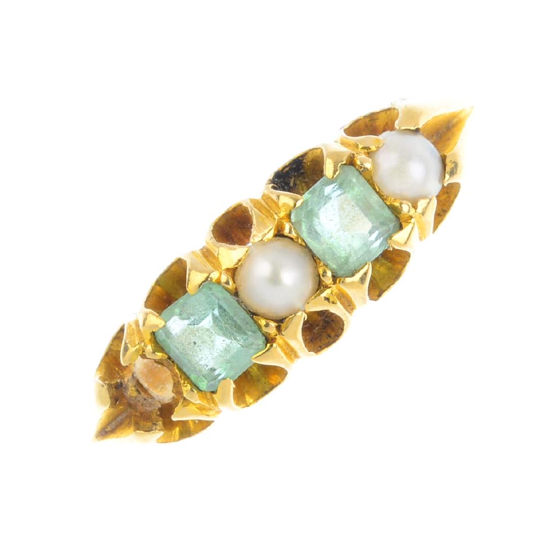 An early 20th century 18ct gold emerald and pearl ring. (1 of 3)
