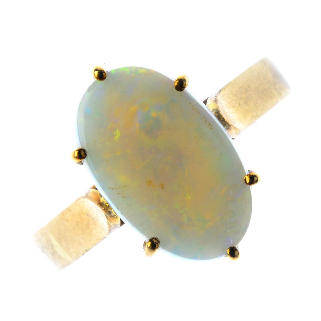 Four gem-set rings. To include a cultured pearl (1 of 3)