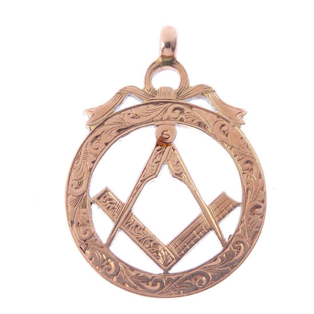 An early 20th century 9ct gold Masonic fob. Of openwork (1 of 2)