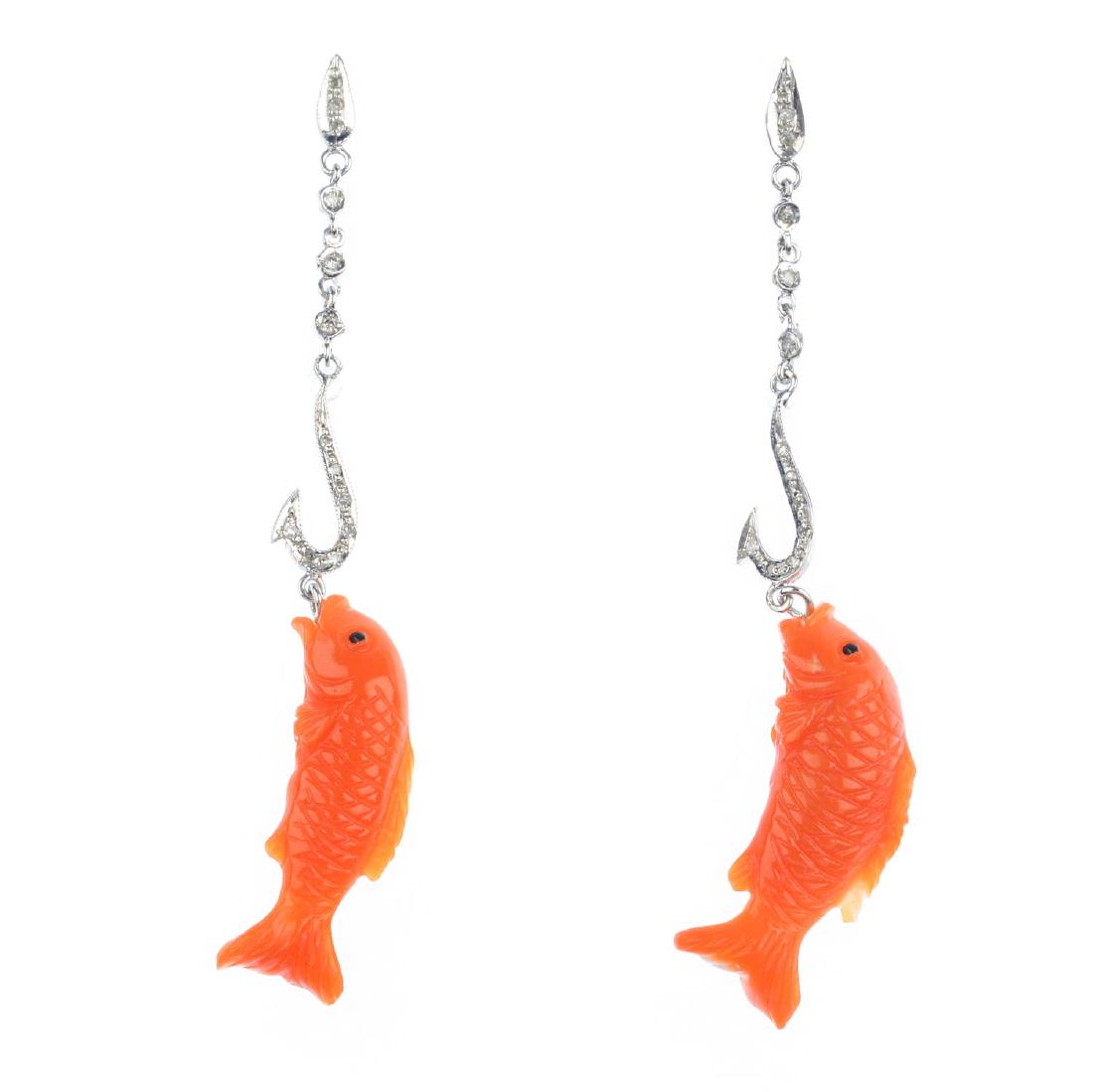 A pair of coral and diamond earrings. Each designed as (1 of 2)