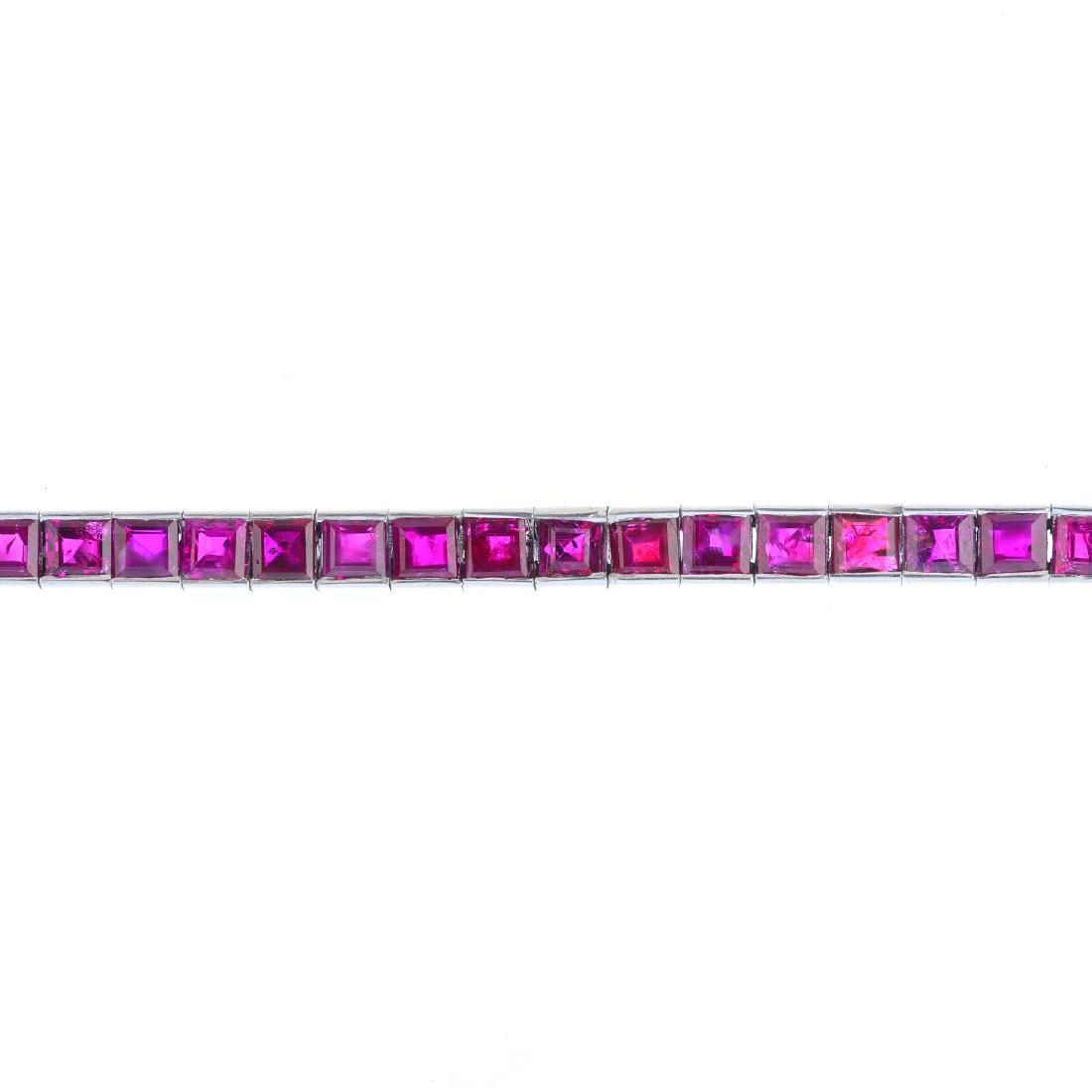 A Burmese ruby bracelet. Designed as a channel-set, (1 of 4)