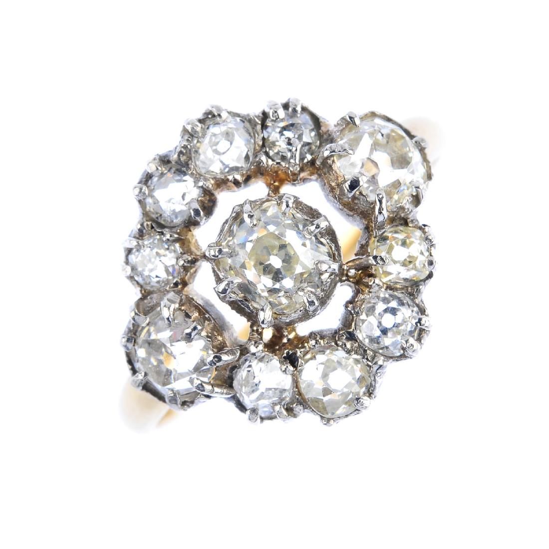 A Georgian silver and gold, diamond cluster ring. The (1 of 3)